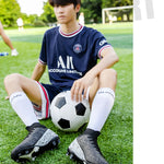 Botas de campo de fútbol profesionales